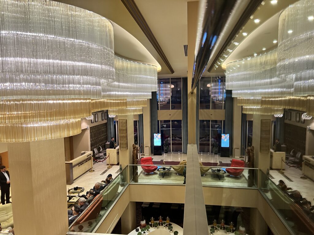 Al Salah Land Hotel chandelier and seating area